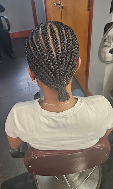 Detailed braid work by M & Co. stylists